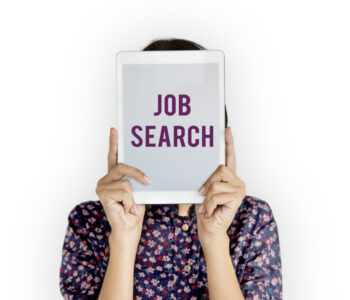 Woman holding a Job search poster